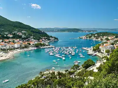 Beautiful landscape of Hvar Island with clear waters and hills.