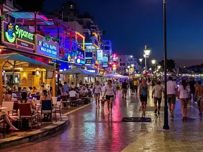 Ayia Napa nightlife with couples, families, and seniors enjoying.