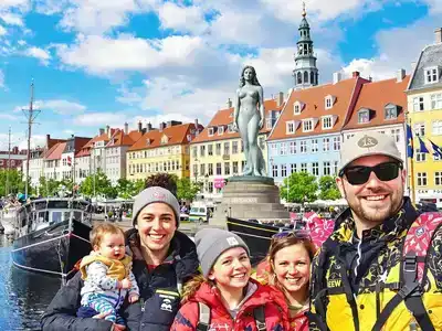 Family enjoying Copenhagen&rsquo;s attractions and vibrant scenery.
