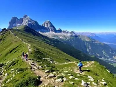 Hikers navigating a challenging mountain trail in Europe.