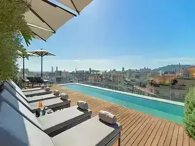 large infinity pool under a clear blue sky