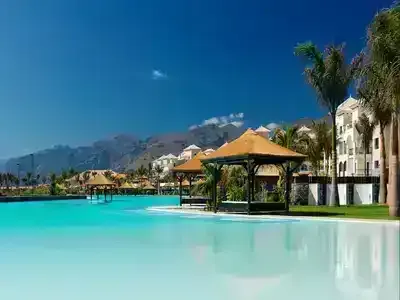 People swimming in a crowded swimming pool