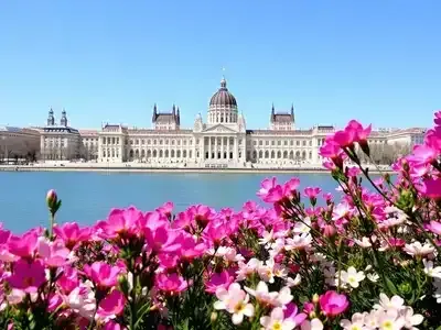 Budapest&rsquo;s Parliament building with spring flowers in bloom.