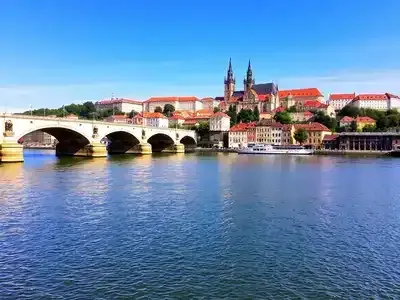 Prague&rsquo;s Charles Bridge and Castle on a sunny day.