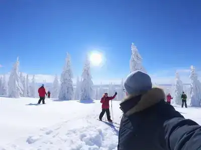 Couples and families enjoying outdoor winter activities in Rovaniemi.