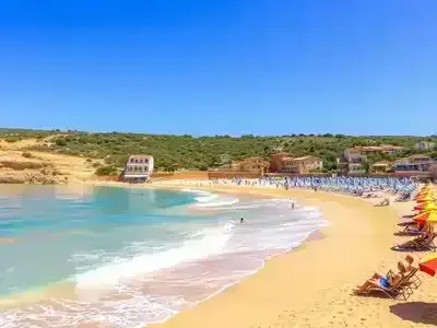 Beautiful beach in Occitanie, France with clear blue waters.