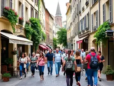 Tourists walking along a scenic street in France.