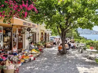 Couples and families enjoying food in Corfu&rsquo;s vibrant market.