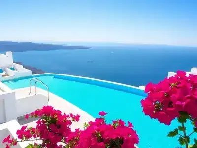 Infinity pool with sea view at Chromata Hotel, Santorini.