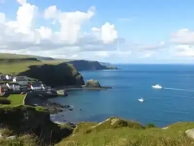 Colorful coastal village in Donegal by the ocean.