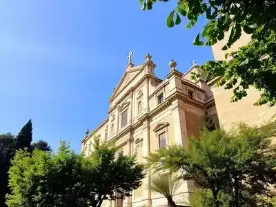 Ancient Italian cathedral with intricate architecture and frescoes.
