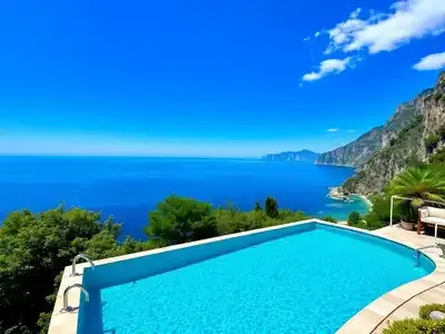 Infinity pool with coastal views of the Amalfi Coast.