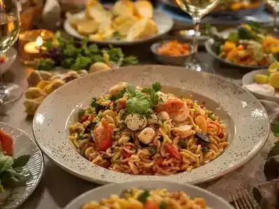 Delicious Venetian dishes on a rustic dining table.