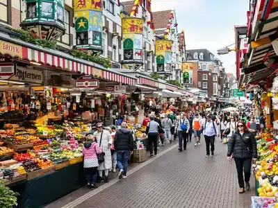 Colorful market stalls in Rotterdam bustling with shoppers.