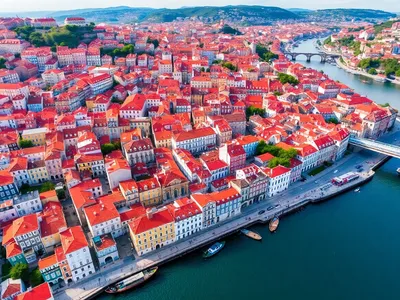 Aerial view of Porto's colorful buildings and river.
