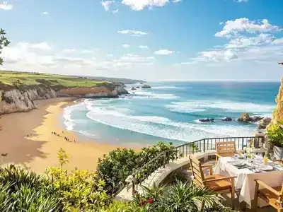 Coastal beach, turquoise sea, outdoor dining, greenery, family activity spot.