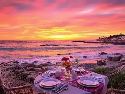 Seaside sunset with charming outdoor dining and joyful family silhouettes.