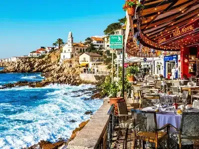 Romantic outdoor table, family enjoying coastal seafood in vibrant setting.