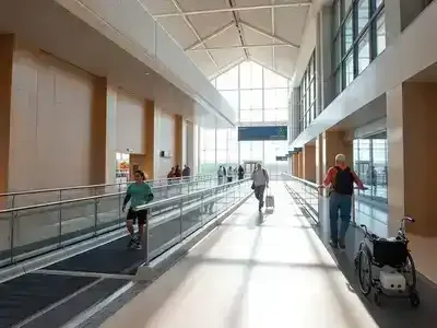 Modern airport terminal in Spain with accessibility features.