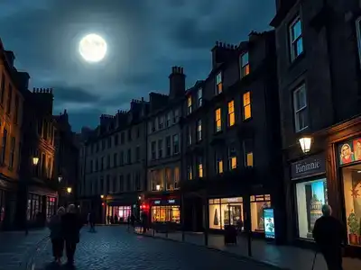 Edinburgh street with a dark moonlit sky.